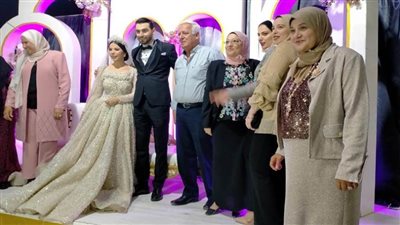 تهنئة بالزفاف للدكتور أيمن والدكتورة ريهام