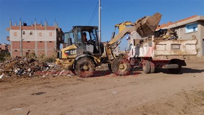 حملات نظافة ورفع مياه الأمطار حول مدارس كفر الشيخ