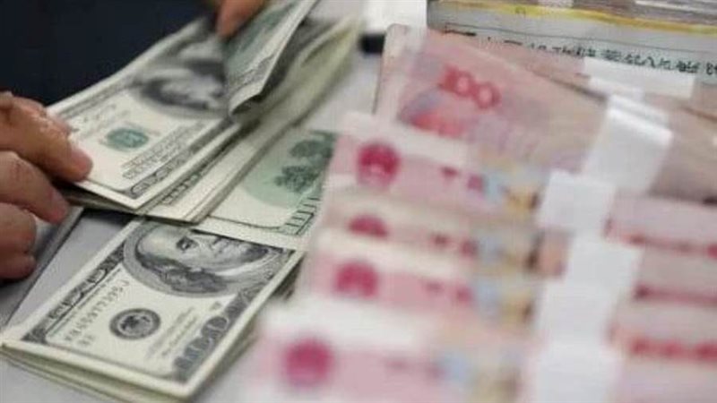 الدولار والرنمينبي