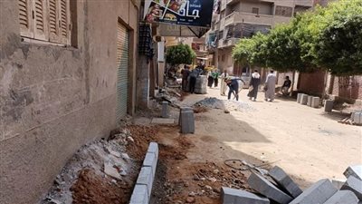  استكمال خطة التطوير وتركيب بلدورات وانترلوك بشوارع مدينة منفلوط بأسيوط