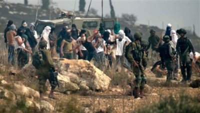 إصابة عشرات الفلسطينيين في هجمات للمستوطنين على قرى برام الله