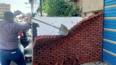 تنفيذ حملة لإزالة الإشغالات والتعديات على حرم الطريق بعدة مناطق بحي ثالث مدينة الإسماعيلية 