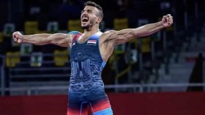 والدة بطل المصارعة: 