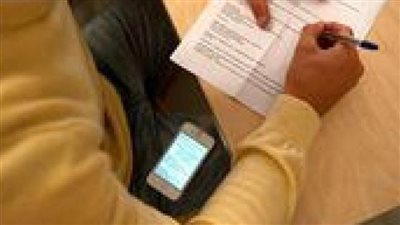 ضبط طالب بالجيزة لقيامه بإدارة مجموعات عبر 