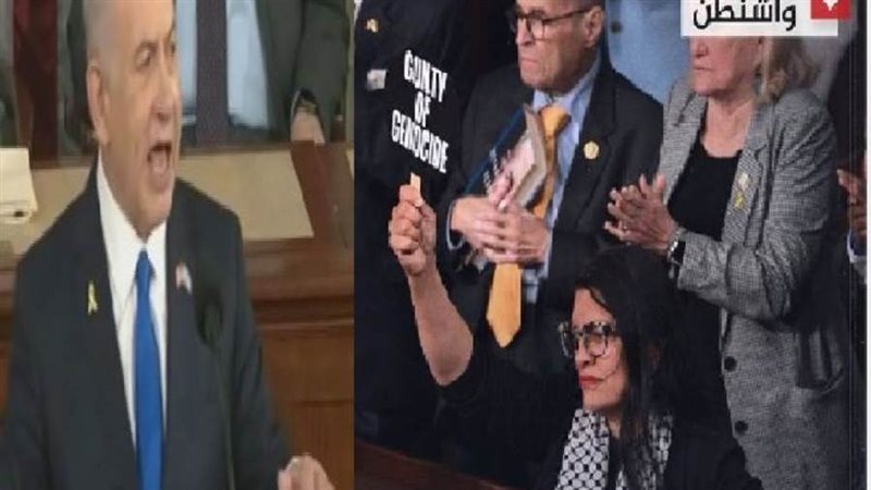 رفع لافتة مجرم حرب