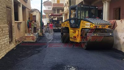 رصف طريق «الجرايدة - المنشية» ببيلا في كفر الشيخ 