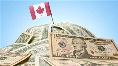 ارتفاع الدولار الكندي أمام الأمريكي وانخفاض عائدات سندات الحكومة