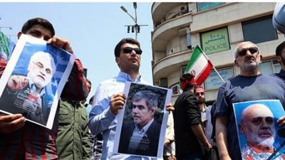  عاجل| بالفيديو والصور.. الإيرانيون ينزلون إلى الشوارع ورفع علم الانتقام الأحمر