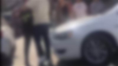 كشف ملابسات تعدى شخص على أحد رجال المرور حال اتخاذه الإجراء القانونى