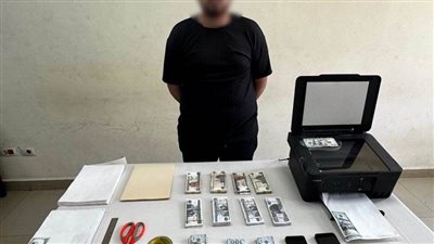 ضبط شخص لقيامه بتقليد العملات الأجنبية وترويجها بالجيزة