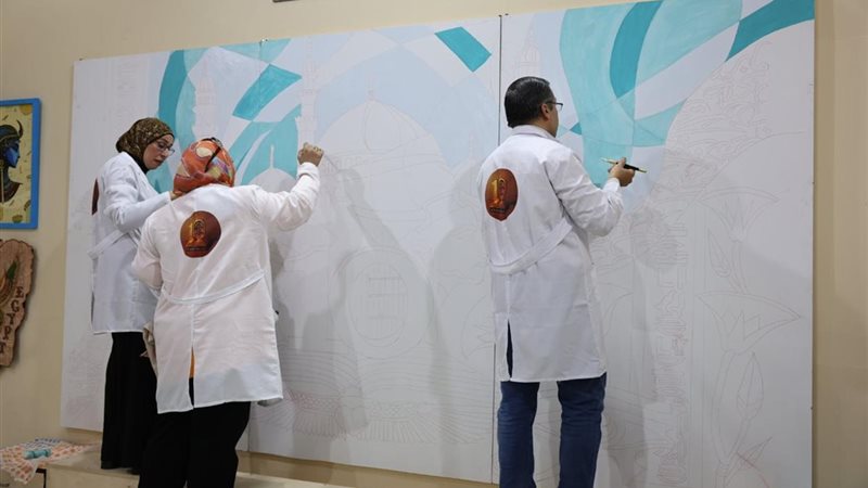 أثناء تنفيذ الجدارية