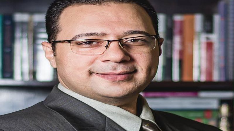 الباحث والكاتب الصحفي هاني