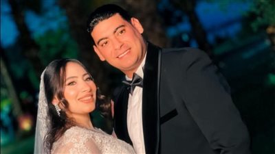 تهنئة بالزفاف السعيد لأحمد وإنجي