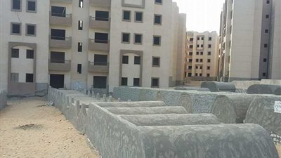 بالصور.. إسكان المنوفية الاجتماعي وسط المقابر