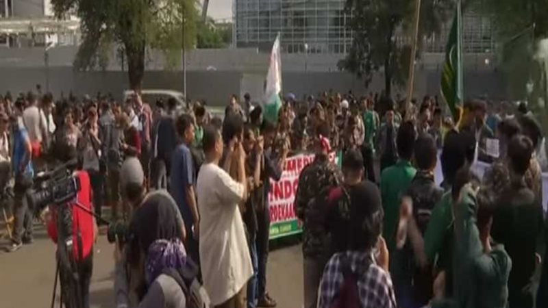 مسيرة احتجاجية للجالية