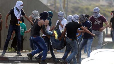 إصابة 66 فلسطينيا في مواجهات مع الاحتلال الإسرائيلي في الضفة