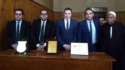 النيابة العامة بالبحيرة تكرم والد شهيد الكنيسة المرقسية