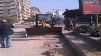 حملة نظافة واسعة بشوارع حي الدقي 