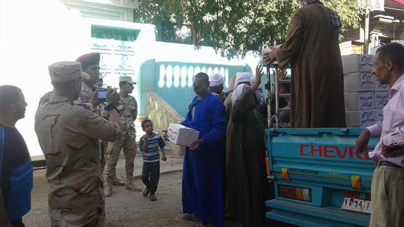 توزيع 15 ألف كرتونة