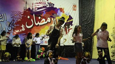 كورال وعرائس بشارع المعز.. صور