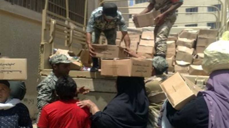 توزيع 64 ألف كرتونة