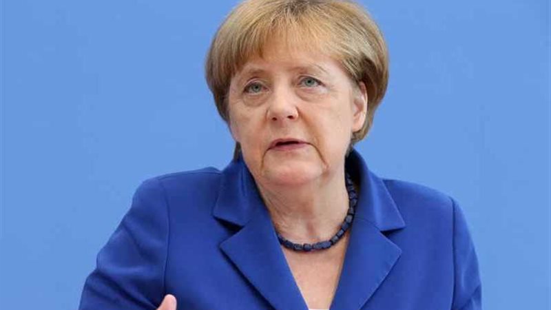 ميركل: حل القضية