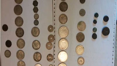 إحباط محاولة تهريب عملات أثرية من مطار القاهرة