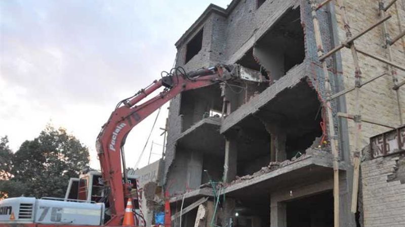 الجيزة تزيل 4 عقارات