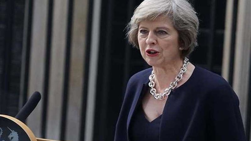 ماي تناشد حزبها للتضحية