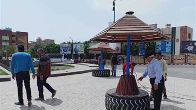 بدء تطوير ميدان عمر مكرم أمام بوابة جامعة أسيوط.. صور