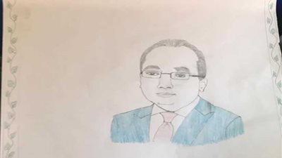 طفل بالأقصر يهدي رئيس الوزراء بورتريهًا