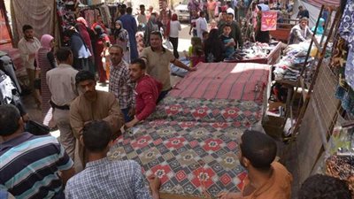 استمرار حملات إزالة الإشغالات وحملة مكبرة بشارع بورسعيد بحي غرب أسيوط