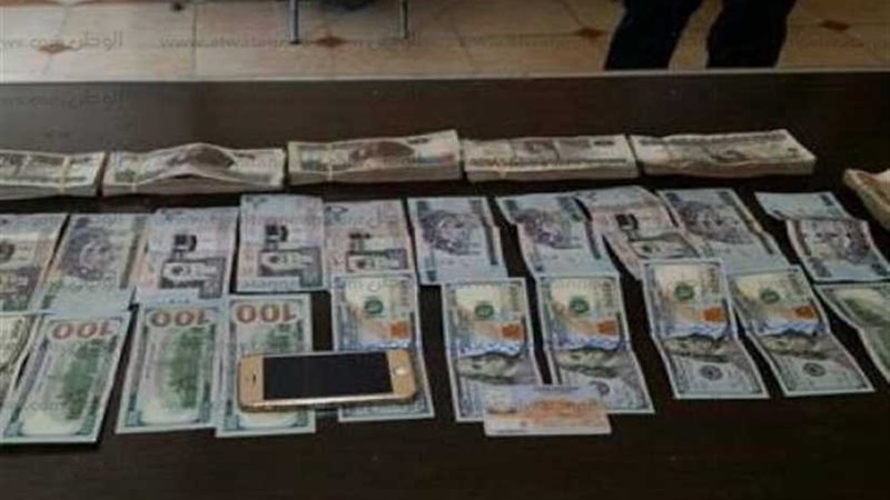 ضبط ضبط تاجر عملةجمع