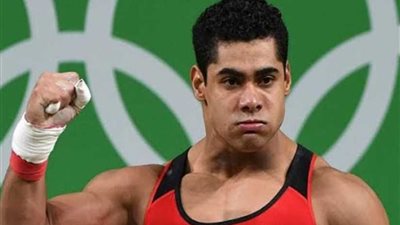بطل رفع الاثقال الأولمبي محمد إيهاب لمحمد صلاح: 