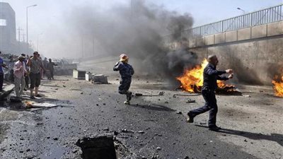 العراق: انفجار عبوة لاصقة بحافلة ركاب في نقطة تفتيش