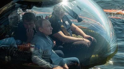 بالصور... بوتين تحت الماء لمدة 30 دقيقة