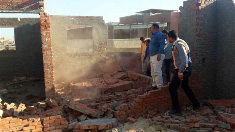 إزالة 10 تعديات بالبناء