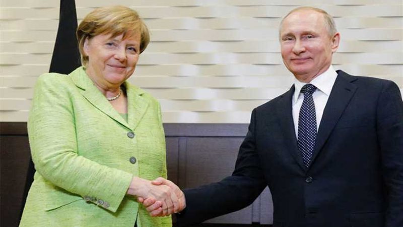 الكرملين: بوتين وميركل