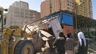 إزالة سوق عشوائية بجسر السويس