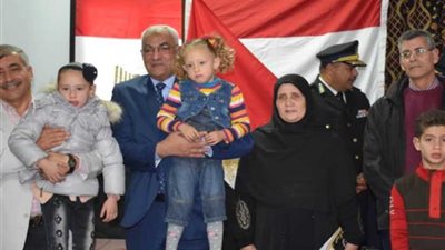 ميناء الإسكندرية تكرم أسر شهداء الشرطة