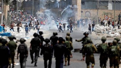 إصابات واعتقالات فى مواجهات بين الفلسطينيين وقوات الاحتلال 