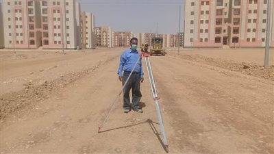 تنفيذ أعمال الطرق والمرافق بـ