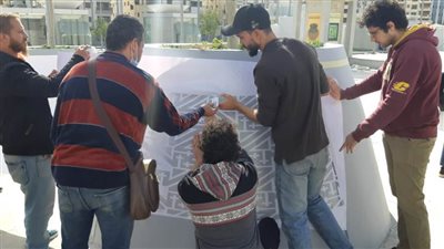 طلبة الفنون يجملون مدخل متحف الحضارة 
