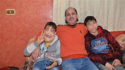 والد الطفلين 