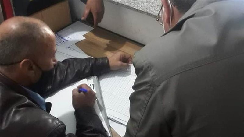 إحالة ٣٤ من العاملين