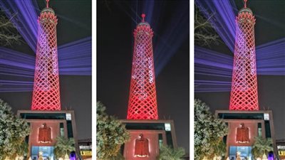 برج القاهرة يتزين باللون الأحمر احتفالًا بوصول مسبار الأمل إلى المريخ