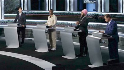 رئيس الوزراء الكندي يواجه انتقادات حادة من خصومه السياسيين في مناظرة