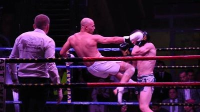 بالصور.. تعرف على العقيد محمدعبده بطل العالم في الكيك بوكسينج بعد تغلبه على بطل روسيا