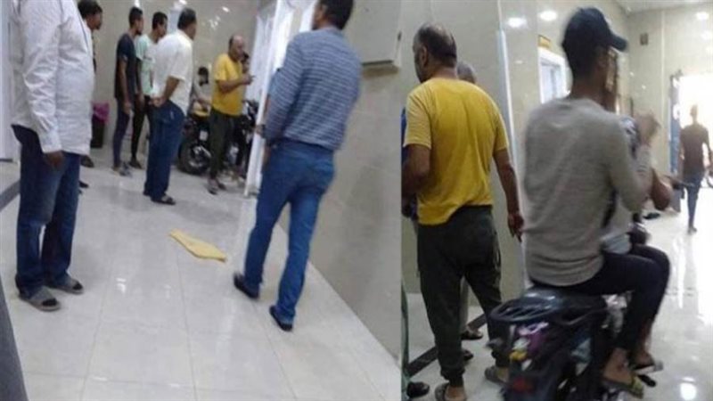 شخصين يستقلان دراجة