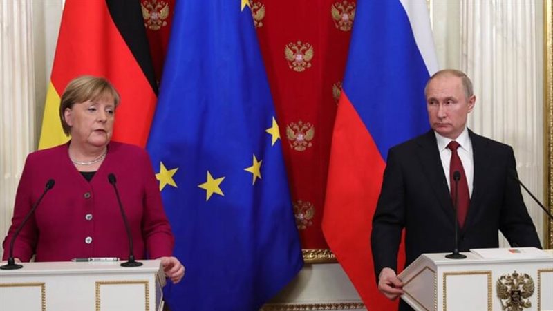 بوتين وميركل - ارشيفية